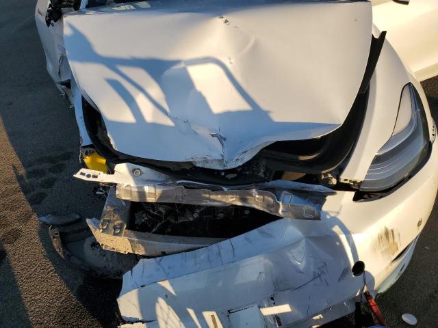 Photo 11 from auction – 2020 TESLA MODEL Y with VIN 5YJYGDEE8LF009965