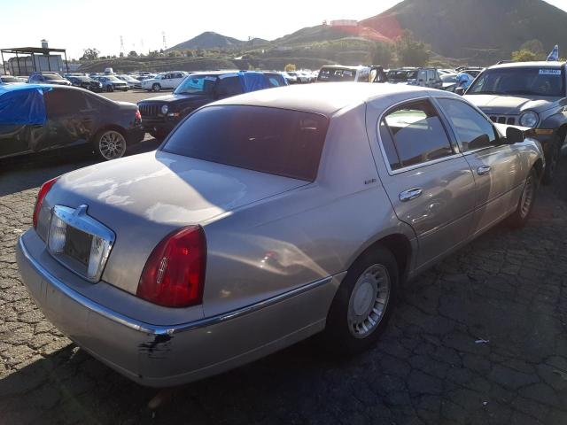 Photo 3 from auction – 2000 LINCOLN TOWN CAR E with VIN 1LNHM81W3YY939807