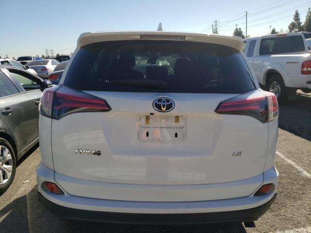 Photo 6 from auction – 2018 TOYOTA RAV4 LE with VIN 2T3ZFREV6JW467273