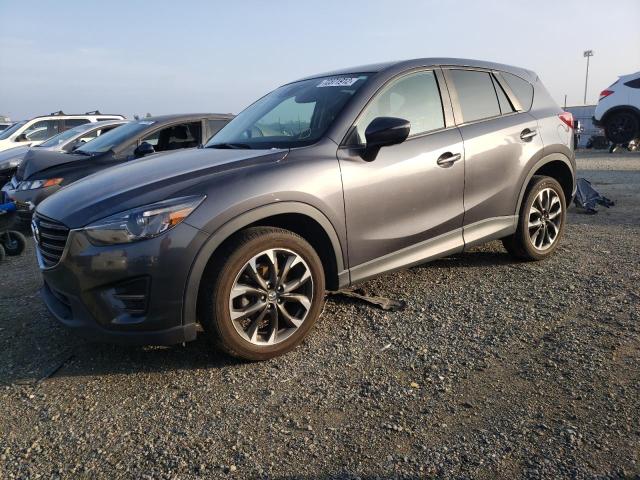 MAZDA CX-5 GT 2016 with VIN JM3KE4DY6G0737612 - Photo from auction
