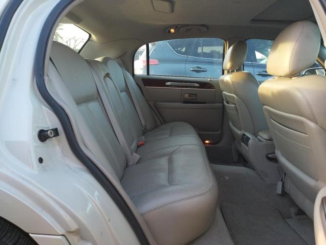 Photo 10 from auction – 2004 LINCOLN TOWN CAR U with VIN 1LNHM83W44Y665668