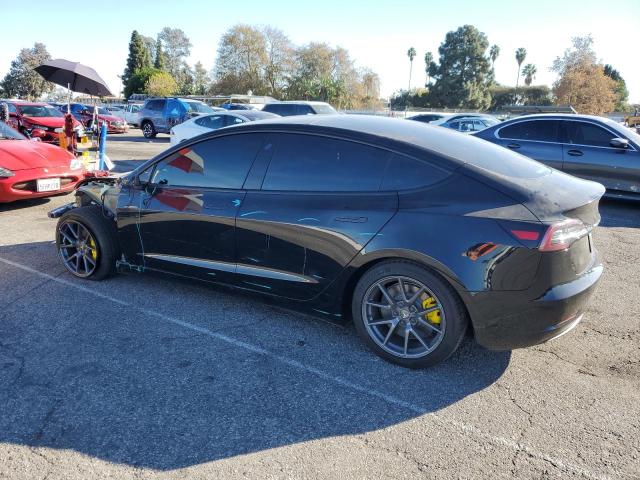 Photo 2 from auction – 2021 TESLA MODEL 3 with VIN 5YJ3E1EA4MF069464
