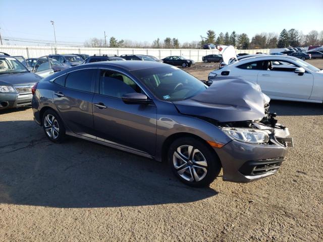 Photo 4 from auction – 2018 HONDA CIVIC LX with VIN 2HGFC2F58JH609190