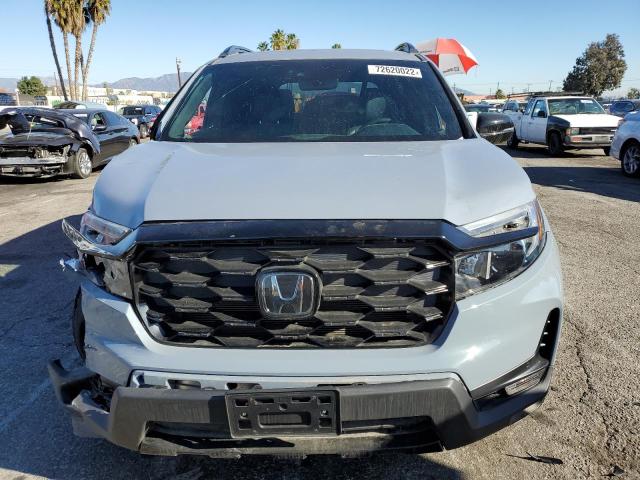 Photo 5 from auction – 2022 HONDA PASSPORT E with VIN 5FNYF8H04NB003710