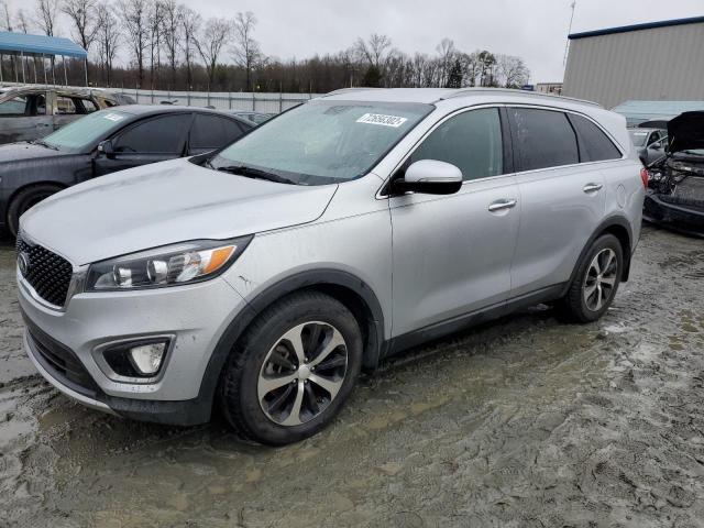 KIA SORENTO EX 2016 with VIN 5XYPH4A55GG023058 - Photo from auction