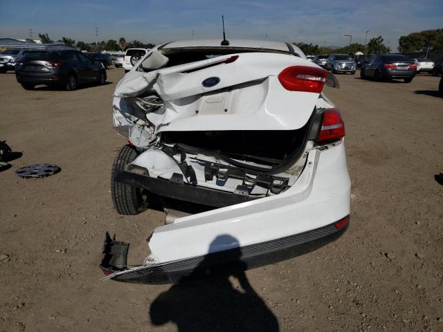 Photo 6 from auction – 2015 FORD FOCUS S with VIN 1FADP3E28FL335948