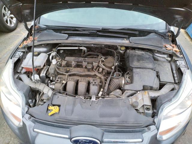 Photo 11 from auction – 2014 FORD FOCUS with VIN 1FADP3F23EL306158