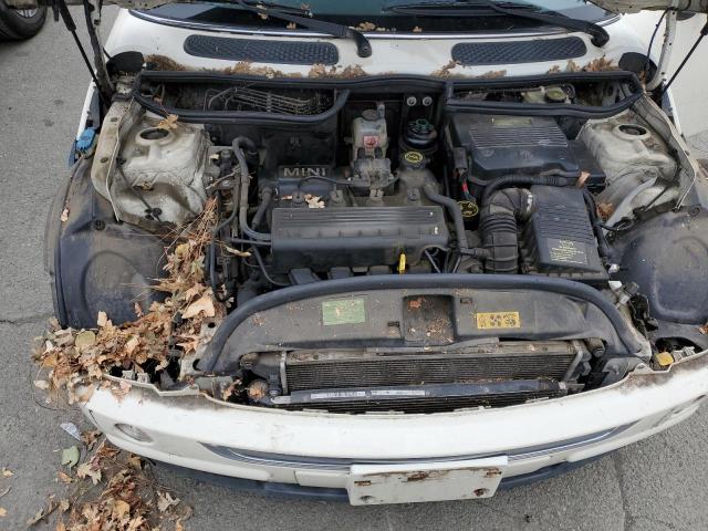 Photo 11 from auction – 2003 MINI COOPER with VIN WMWRC33423TC48154