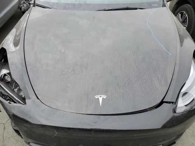 Photo 11 from auction – 2022 TESLA MODEL Y with VIN 7SAYGDEF9NF382768