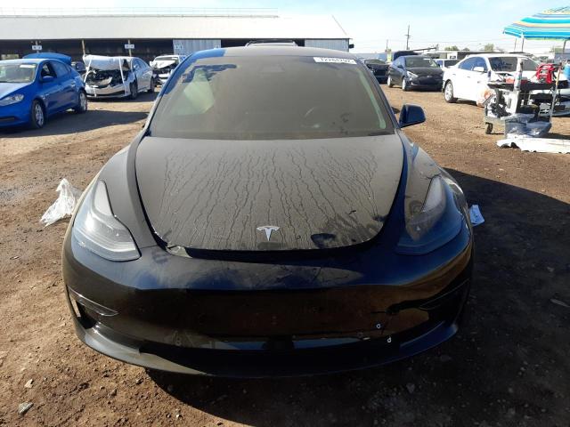 Photo 5 from auction – 2021 TESLA MODEL 3 with VIN 5YJ3E1EC9MF070496