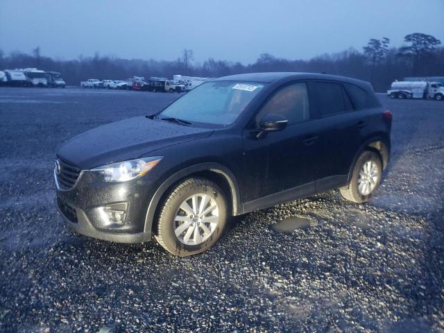 MAZDA CX-5 2016 with VIN JM3KE4CY3G0875299 - Photo from auction