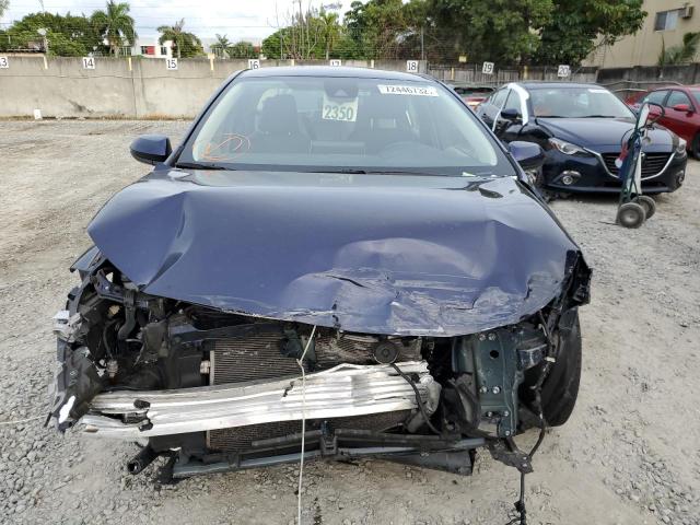 Photo 5 from auction – 2021 TOYOTA COROLLA LE with VIN JTDEPMAE2MJ126556