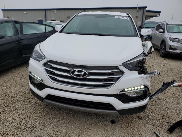Photo 5 from auction – 2018 HYUNDAI SANTA FE S with VIN 5NMZU3LB2JH105215