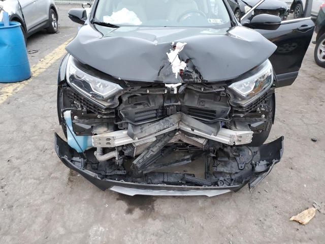 Photo 11 from auction – 2018 HONDA CR-V EXL with VIN 7FARW2H81JE062199