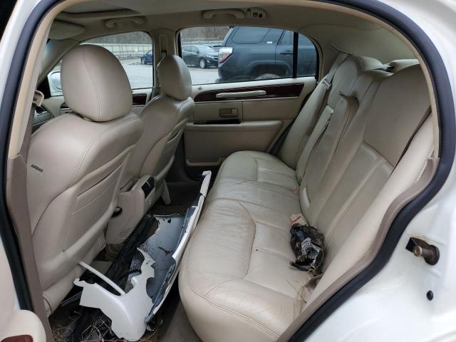 Photo 10 from auction – 2004 LINCOLN TOWN CAR U with VIN 1LNHM83W34Y681733