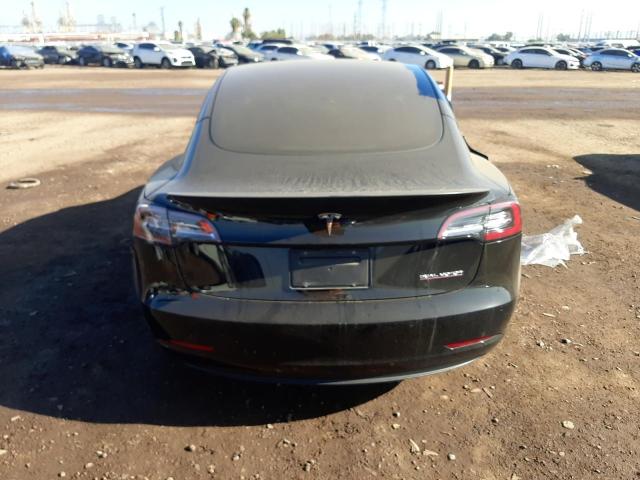 Photo 6 from auction – 2021 TESLA MODEL 3 with VIN 5YJ3E1EC9MF070496