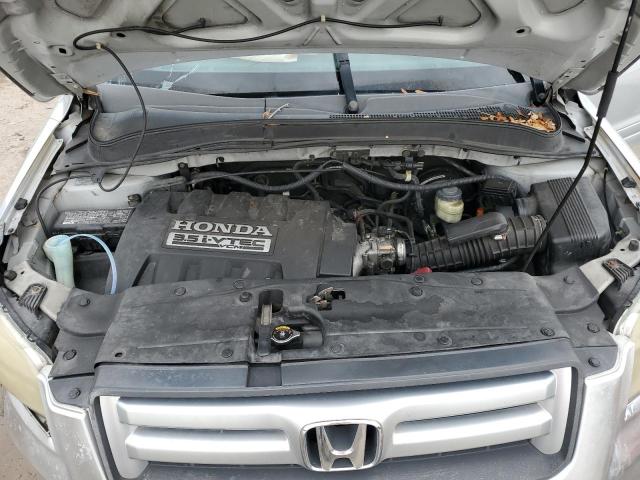 Photo 12 from auction – 2006 HONDA PILOT EX with VIN 5FNYF28556B027699