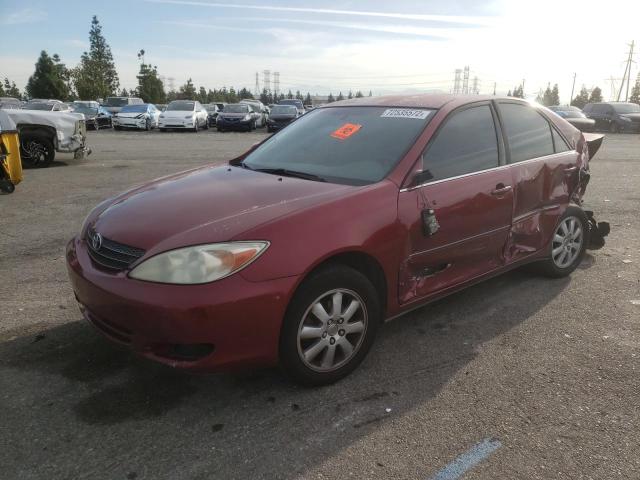 TOYOTA CAMRY 2002 with VIN JTDBE30K420095842 - Photo from auction