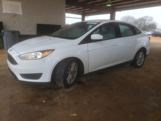 FORD FOCUS SE 2018 with VIN 1FADP3F26JL318864 - Photo from auction