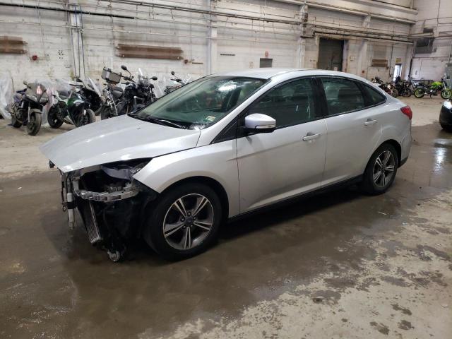 FORD FOCUS SE 2017 with VIN 1FADP3FE1HL309610 - Photo from auction