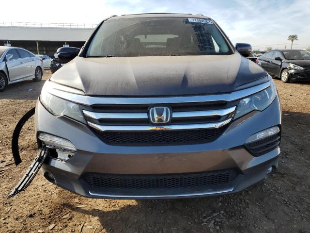 Photo 5 from auction – 2017 HONDA PILOT ELIT with VIN 5FNYF6H05HB046378