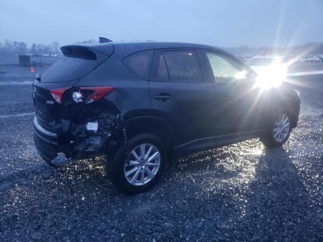 Photo 3 from auction – 2016 MAZDA CX-5 with VIN JM3KE4CY3G0875299