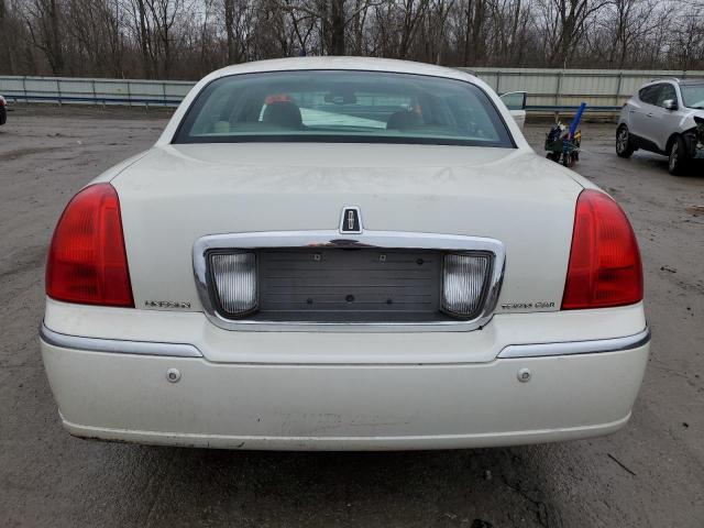 Photo 6 from auction – 2004 LINCOLN TOWN CAR U with VIN 1LNHM83W34Y681733