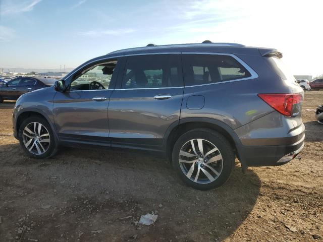 Photo 2 from auction – 2017 HONDA PILOT ELIT with VIN 5FNYF6H05HB046378