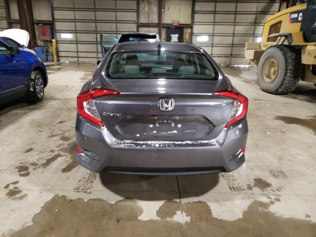 Photo 6 from auction – 2018 HONDA CIVIC EX with VIN 19XFC2F74JE038342