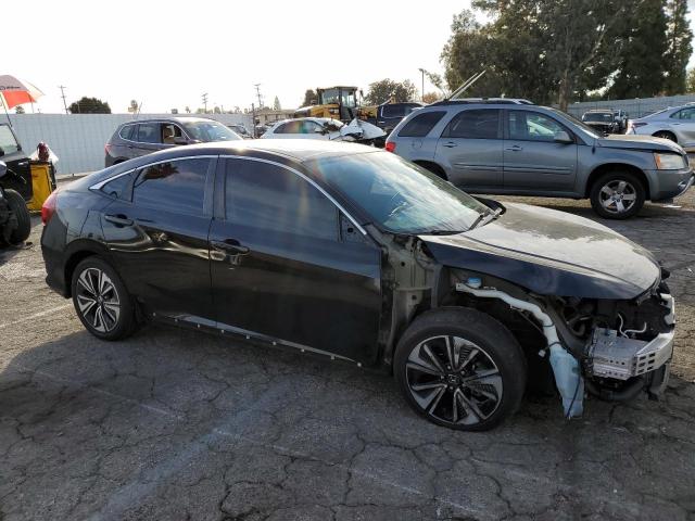 Photo 4 from auction – 2016 HONDA CIVIC EXL with VIN 2HGFC1F72GH652542