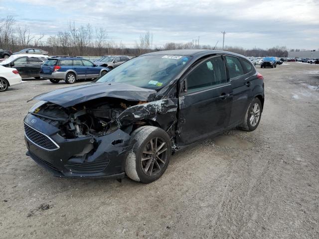 FORD FOCUS SE 2015 with VIN 1FADP3K2XFL289933 - Photo from auction