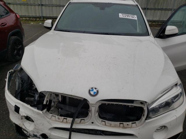 Photo 11 from auction – 2014 BMW X5 XDRIVE5 with VIN 5UXKR6C58E0J71626