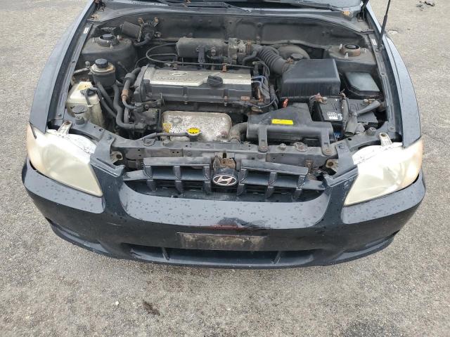 Photo 11 from auction – 2002 HYUNDAI ACCENT GL with VIN KMHCG45C52U404647