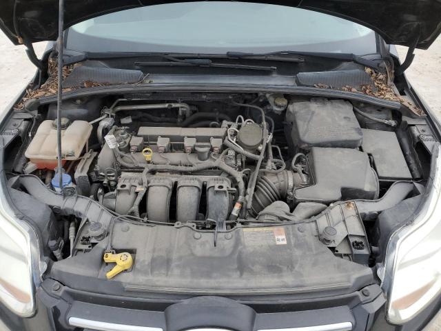 Photo 11 from auction – 2014 FORD FOCUS S with VIN 1FADP3E22EL138031