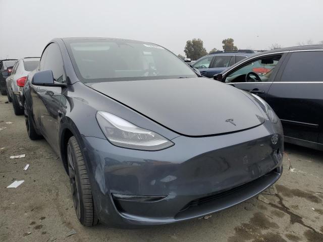 Photo 4 from auction – 2023 TESLA MODEL Y with VIN 7SAYGDEF1PF598634