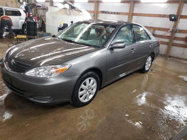 TOYOTA CAMRY LE 2002 with VIN 4T1BF30K52U509051 - Photo from auction