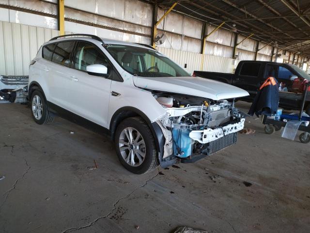 Photo 4 from auction – 2018 FORD ESCAPE SE with VIN 1FMCU9GD4JUB46647