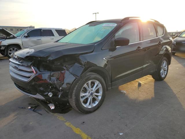 FORD ESCAPE SE 2018 with VIN 1FMCU9GD3JUA27195 - Photo from auction