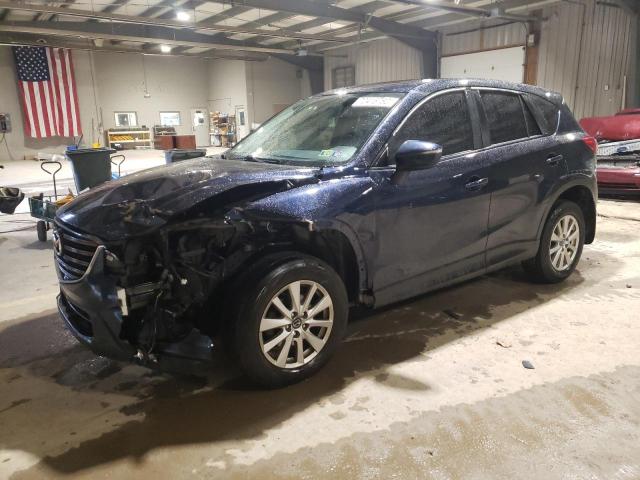 MAZDA CX-5 SPORT 2016 with VIN JM3KE4BY6G0772038 - Photo from auction