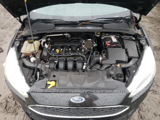 Photo 11 from auction – 2015 FORD FOCUS SE with VIN 1FADP3F26FL270614