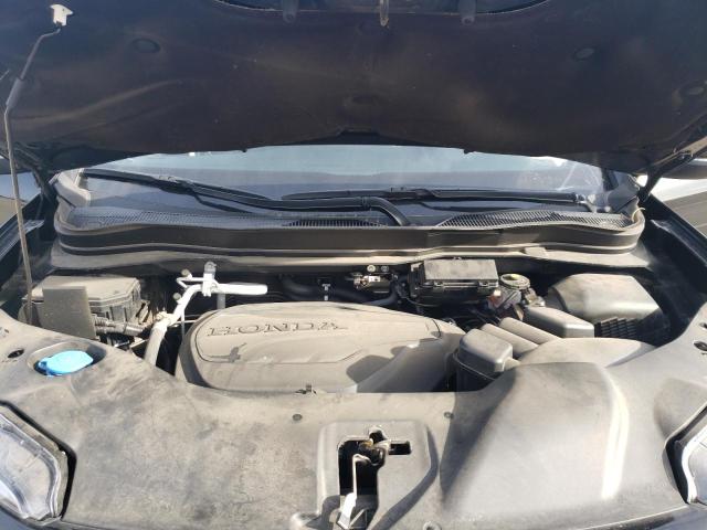 Photo 12 from auction – 2021 HONDA PASSPORT E with VIN 5FNYF8H53MB006219