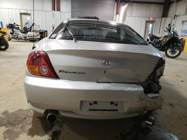 Photo 6 from auction – 2003 HYUNDAI TIBURON with VIN KMHHM65DX3U041640