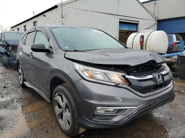 Photo 4 from auction – 2015 HONDA CR-V LX with VIN 5J6RM4H38FL077962