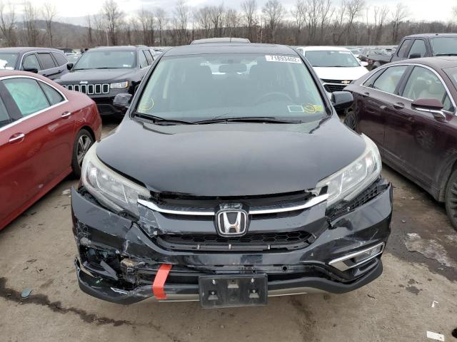 Photo 5 from auction – 2015 HONDA CRV with VIN 2HKRM4H57FH689288