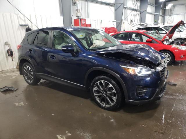 Photo 4 from auction – 2016 MAZDA CX-5 GT with VIN JM3KE4DYXG0850155