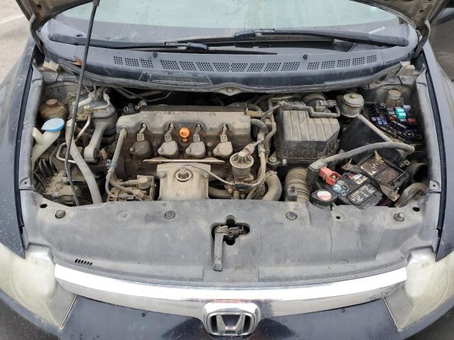 Photo 11 from auction – 2006 HONDA CIVIC LX with VIN JHMFA155X6S010046