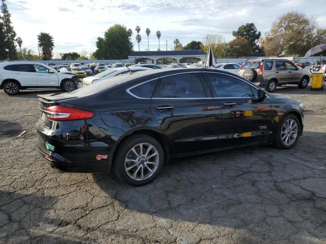Photo 3 from auction – 2018 FORD FUSION TIT with VIN 3FA6P0SU2JR110349