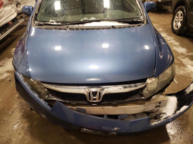 Photo 11 from auction – 2011 HONDA CIVIC LX with VIN 19XFA1F58BE014772