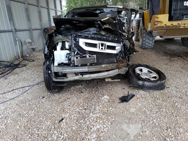 Photo 5 from auction – 2011 HONDA PILOT LX with VIN 5FNYF3H20BB053228