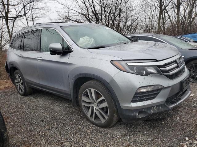 Photo 4 from auction – 2018 HONDA PILOT TOUR with VIN 5FNYF6H95JB028659